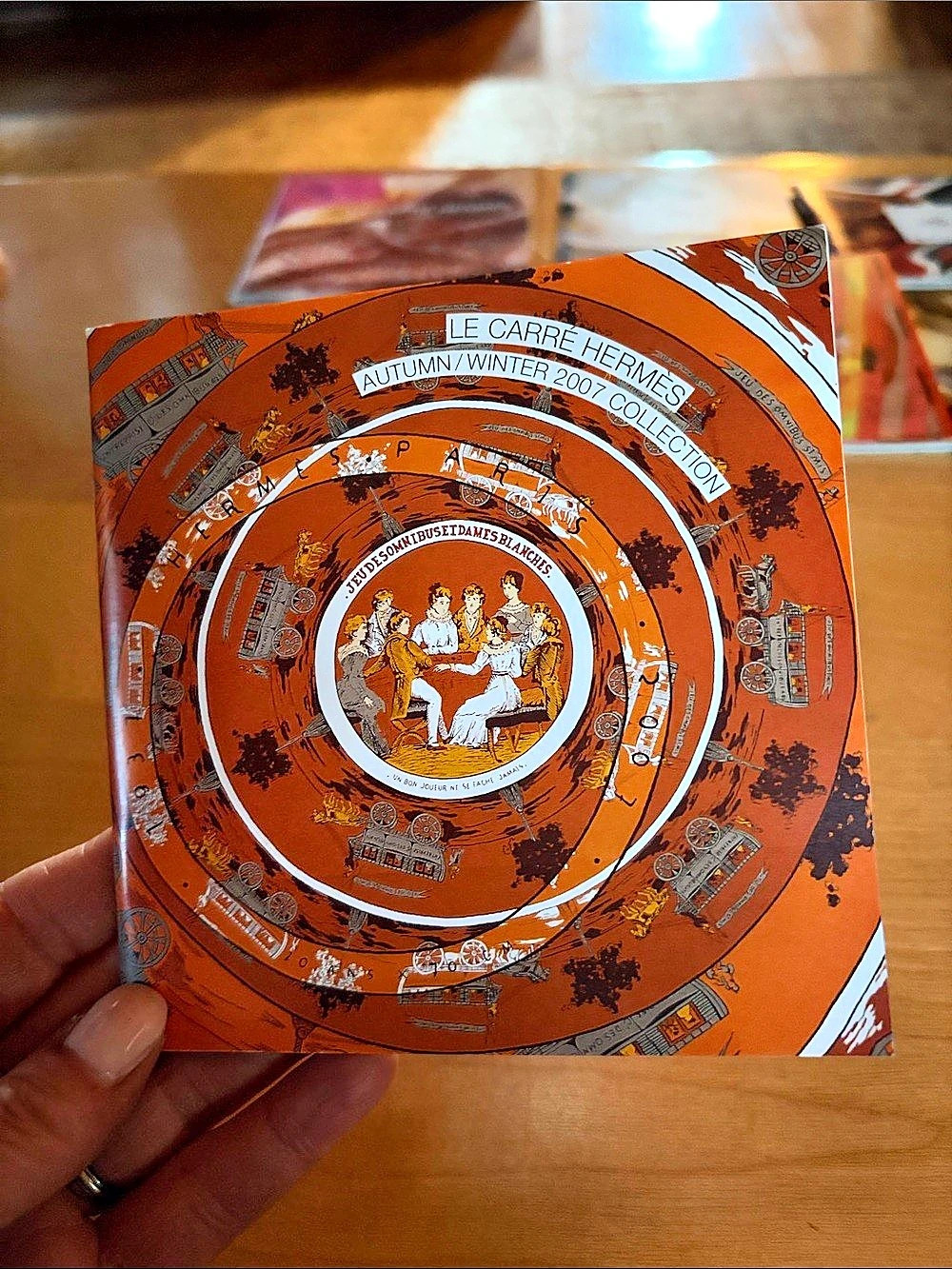 Hermès Le Carré Hermès: Jeu des Omnibus et Dames Blanches Silk Scarf in Orange &